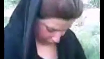 Hijab-Clad Arab Woman Indulges In Outdoor Sex